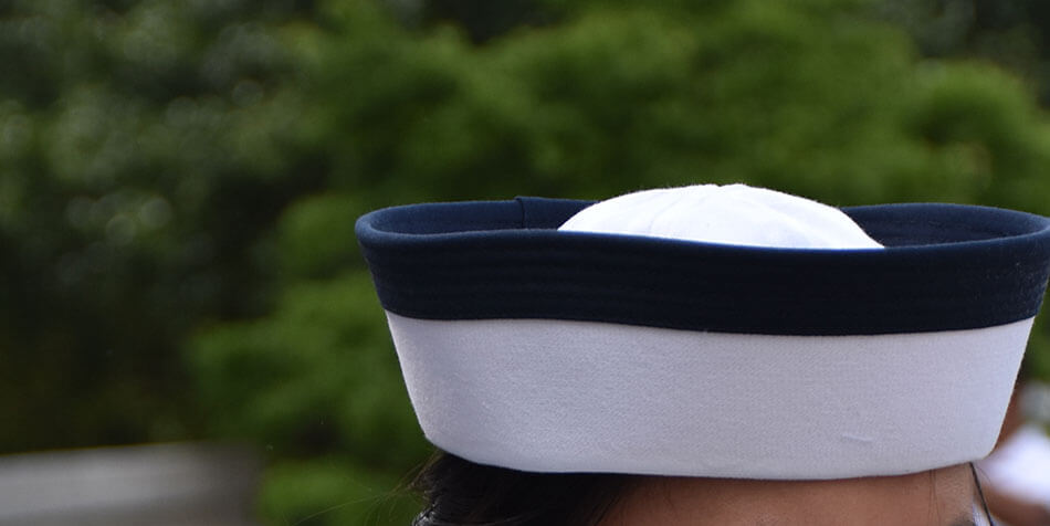 Naval Academy white dress uniform and cap